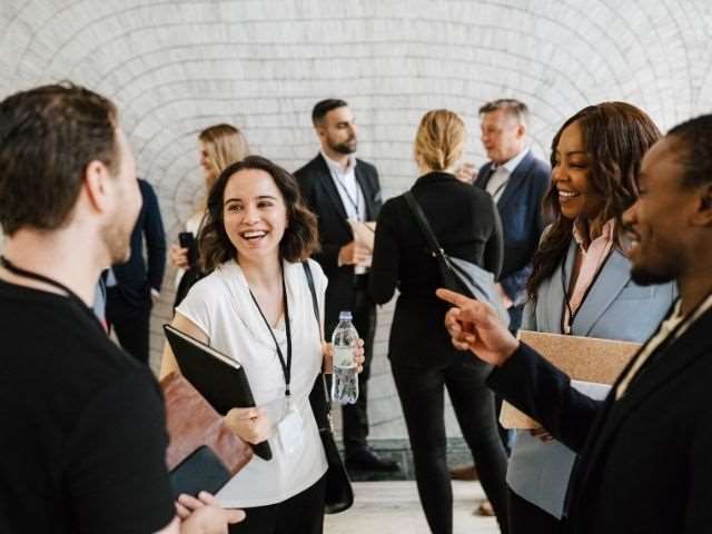 Groups of people in discussion demonstrating EDGE engagement opportunities