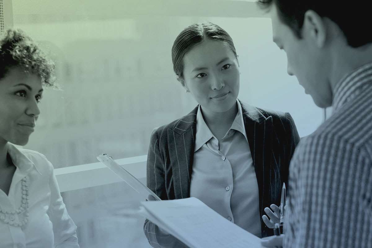 A few people talking and collaborating